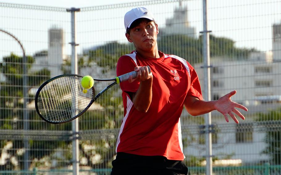 Aaden Otteson plays tennis.