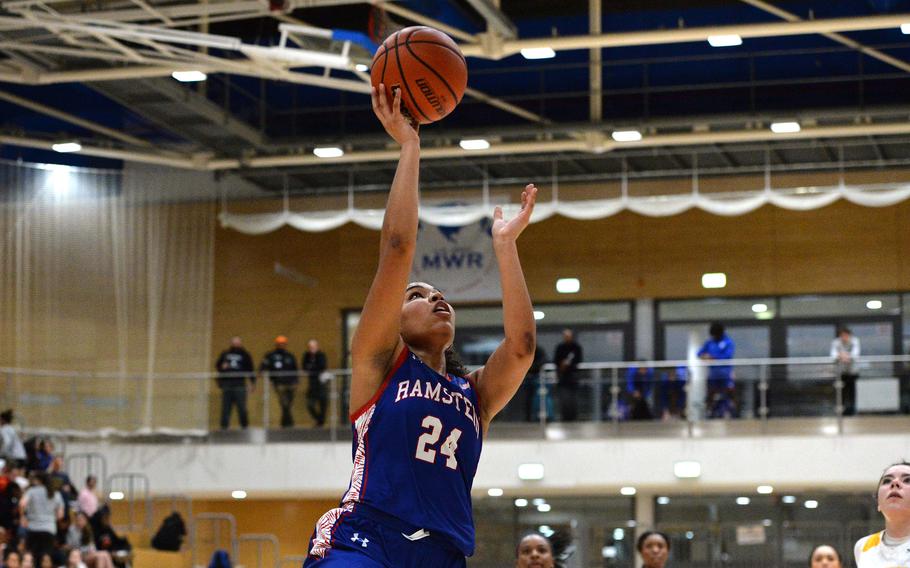 Ramstein’s Jasmine Jones goes to the hoop against Stuttgart in the girls Division I final at the DODEA-Europe basketball championships in Wiesbaden, Germany, Feb. 17, 2024. Stuttgart won the game 33-26.