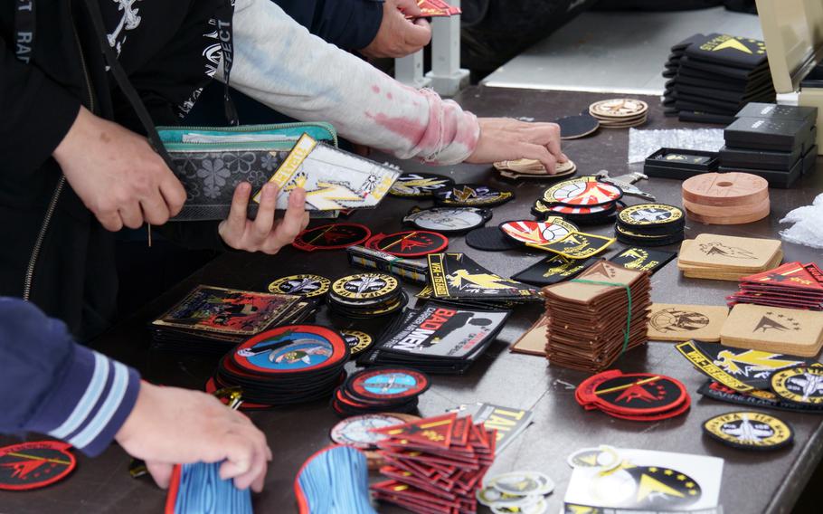 Visitors line up to purchase unit patches during Spring Festival at Naval Air Facility Atsugi, Japan, April 22, 2023.
