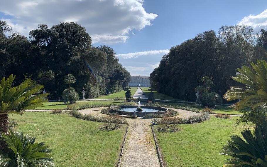 The Royal Palace of Caserta near Naples, Italy, is visible in the background of this view from the Royal Park's parterre. 