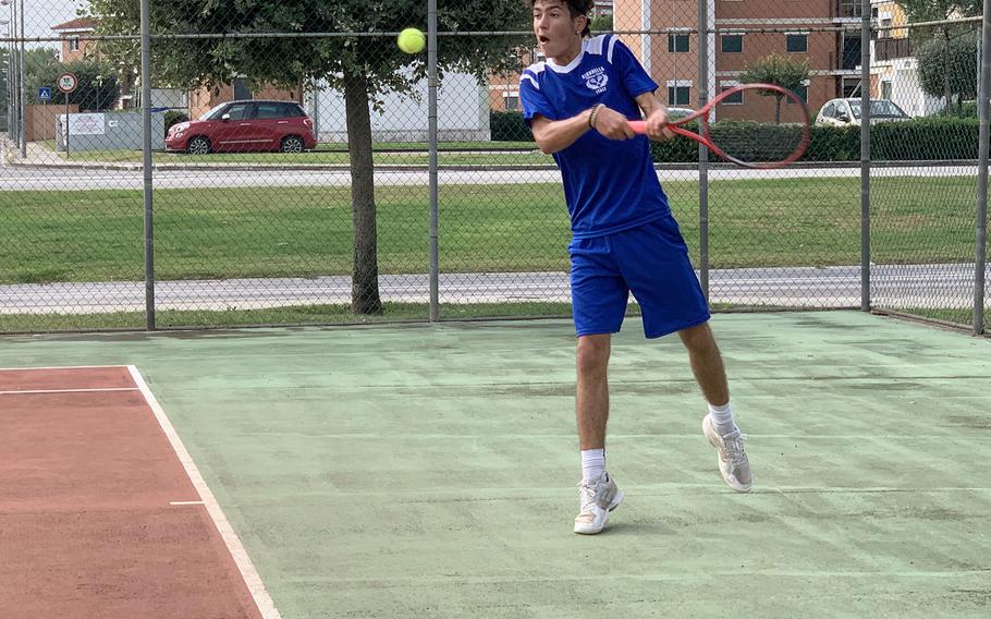 Lawrence Caro of Sigonella prepares to hit the ball in boys singles semifinals in the DODEA-Europe South tennis finals at Naval Support Activity Naples’ Gricignano di Aversa site on Saturday, Oct. 23, 2021. Caro went on to win the boys singles final. 