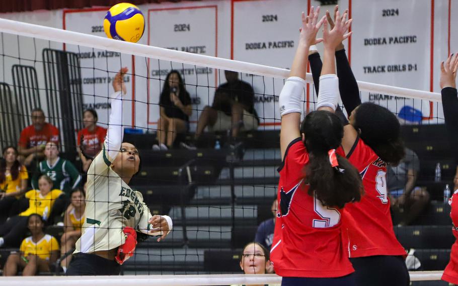 Nadiah Miller hits the ball.