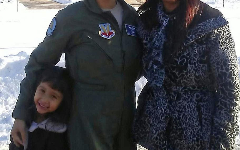 Air Force veteran Isabelle Hyon DuCharme poses with her mother, Hyon Chu, and an unidentified family member in January 2017.