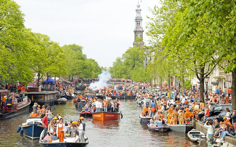 Amsterdam’s canals fill with revelers each King’s Day, April 27. Many places in the Netherlands will celebrate.