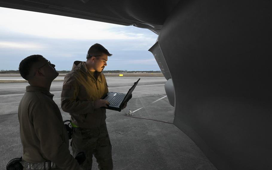 U.S. Air Force Senior Airman Kade Parsons and Tech Sgt. Jose Sanchez, low observable aircraft structural maintenance specialists with the Wisconsin Air National Guard’s 115th Fighter Wing, perform maintenance on an F-35A Lightning II aircraft during a Weapons System Evaluation Program exercise Feb. 13, 2024, at Tyndall Air Force Base, Fla. 