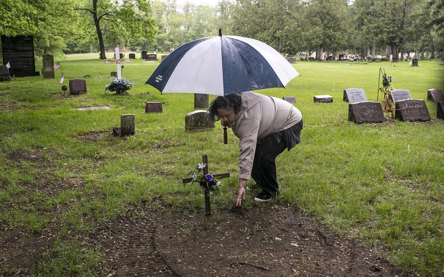 Amanda De Cora visits her mother's grave on May 27, 2021. Her mother died in early May. 