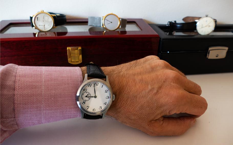 The author models the Initium watch he made in Geneva, Switzerland. 