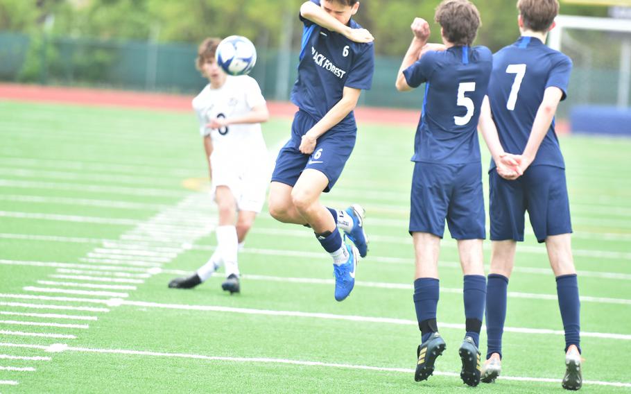 Alessandro Vavra takes a free kick.