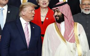 President Donald Trump, left, speaks with Saudi Arabia’s Crown Prince Mohammed bin Salman during a photo session.