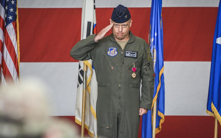 Col. Matthew Gaetke, outgoing 8th Fighter Wing commander, salutes his arimen during a change-of-command ceremony at Kunsan Air Base, South Korea, June 7, 2024. 