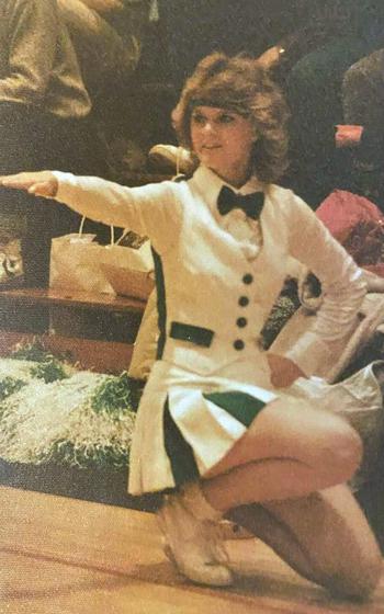 Debbie Mills cheers for Kubasaki High School at Camp Foster, Okinawa, in the early 1980s.