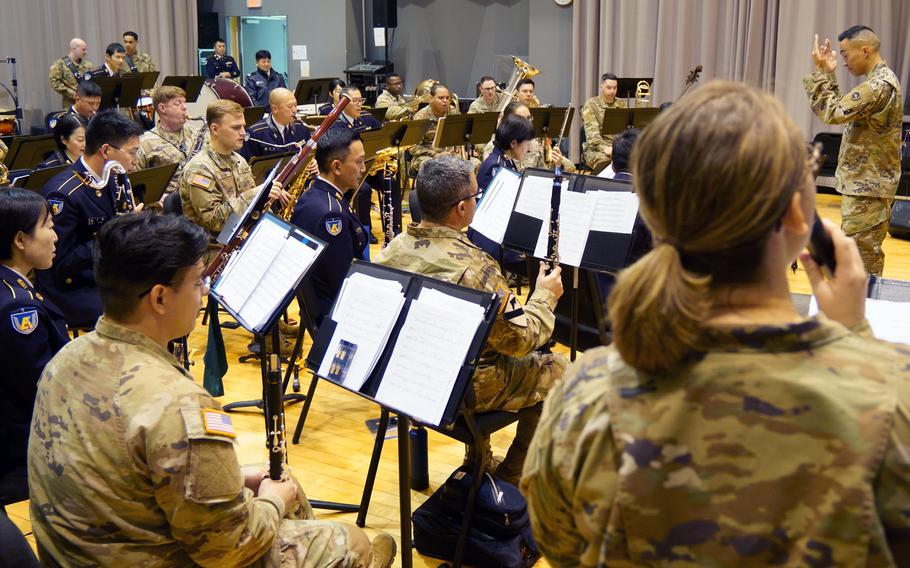 Members of the U.S. Army Japan and Japan Ground Self-Defense Force bands practice at Camp Zama, Japan, Dec. 13, 2023.