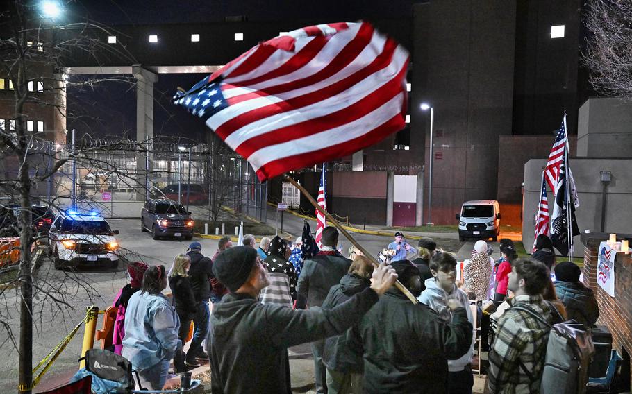 Demonstrators rally Jan. 5, 2022, outside of a Washington jail, where a group of defendants charged in the Jan. 6, 2021, attack on the U.S. Capitol are being held. 