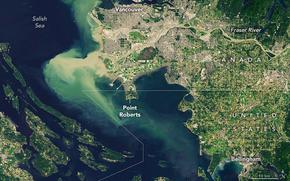 A satellite image of land and sea, with labels for Canada, the United States and other major landmarks.