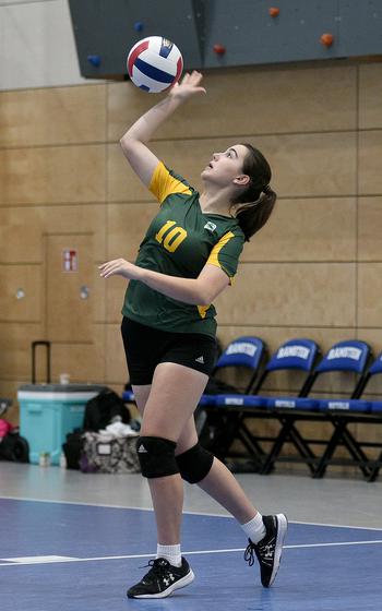 SHAPE middle blocker Sofia Tryon serves during a scrimmage at Ramstein High School on Sept. 1, 2023, on Ramstein Air Base, Germany.