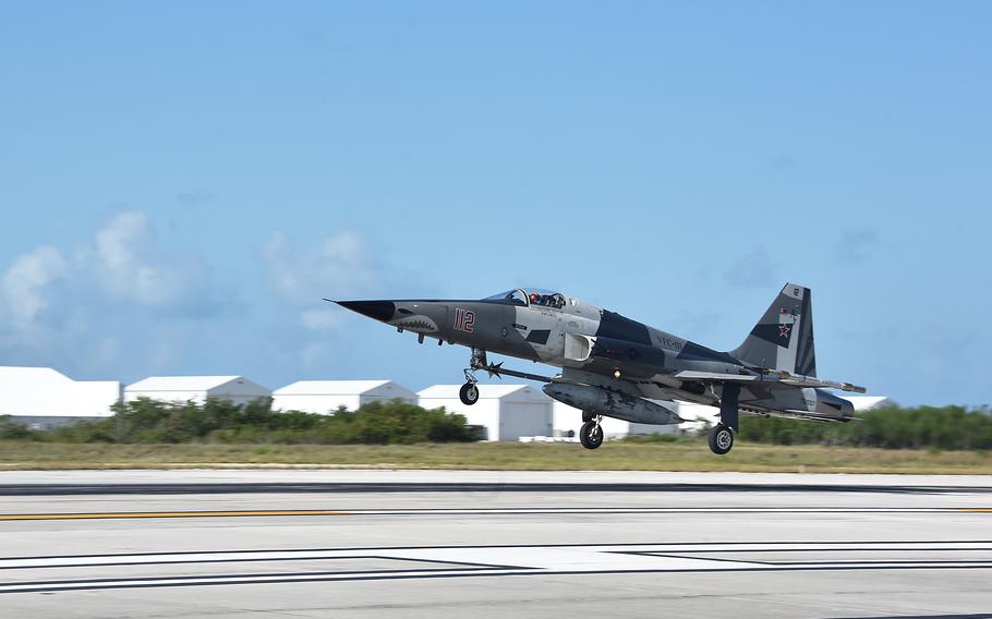 An F-5N Tiger jet with Fighter Squadron Composite (VFC) 111 Sun Downers lands at Naval Air Station Key West’s Boca Chica Field after training with Strike Fighter Squadron (VFA) 122 Flying Eagles in June 2020.