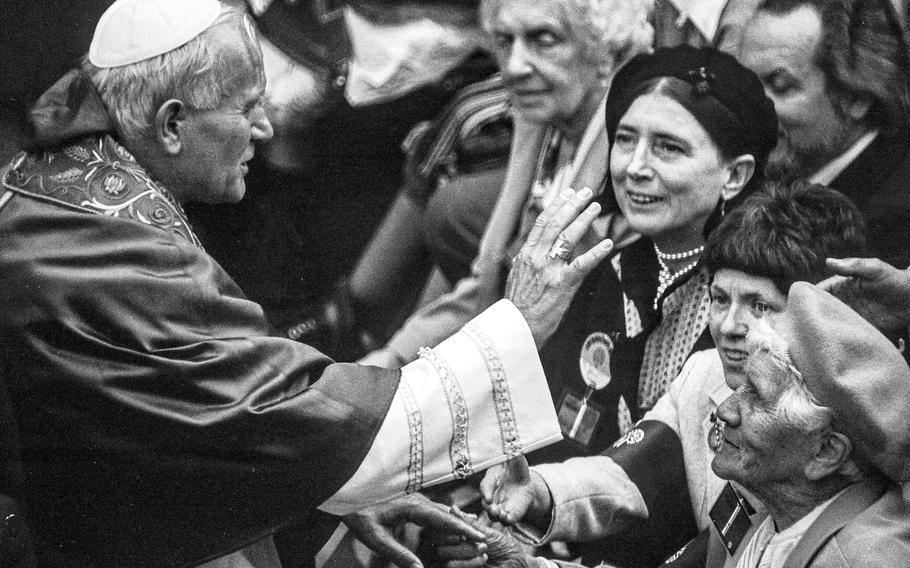 London, England, May 1982: Pope John Paul II stops to bless some of the faithful at St. George’s Cathedral. Large crowds greeted the pontiff on his first trip to London, which included a visit with Queen Elizabeth II at Buckingham Palace. 