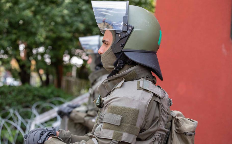 Austrian soldiers with Kosovo Force Regional Command-East respond June 1, 2023, to unrest in Zvecan, Kosovo, where violence caused injuries to soldiers and demonstrators.