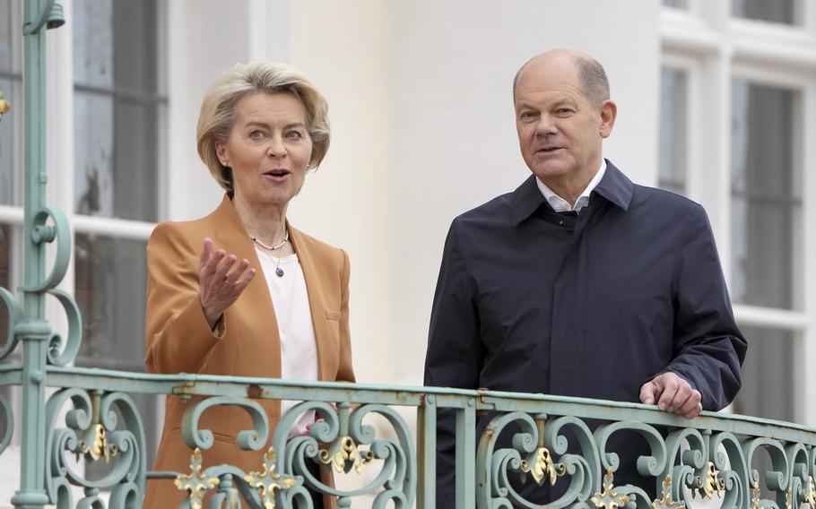 Germany Chancellor Olaf Scholz, right, welcomes European Commission President Ursula von der Leyen, left, for a meeting as part of a two-day closed meeting of the German government at Meseberg palace in Gransee near Berlin, Germany, March 5, 2023. 