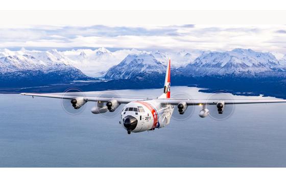 A Coast Guard Air Station HC-130 Hercules aircrew flying in Kachemak Bay, Alaska, December 1, 2023.