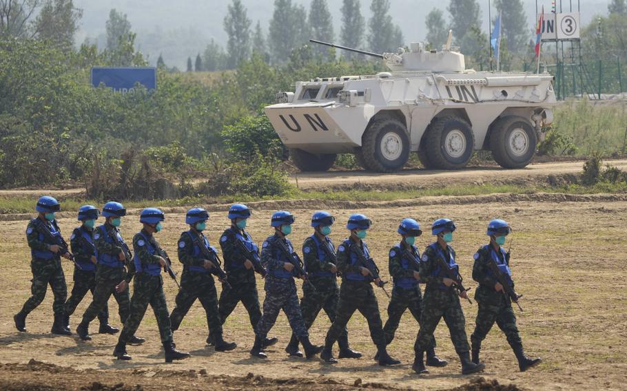 United Nations troop from Thailand take part in the Shared Destiny 2021 drill at the Queshan Peacekeeping Operation training base in Queshan County in central China's Henan province Wednesday, Sept. 15, 2021.
