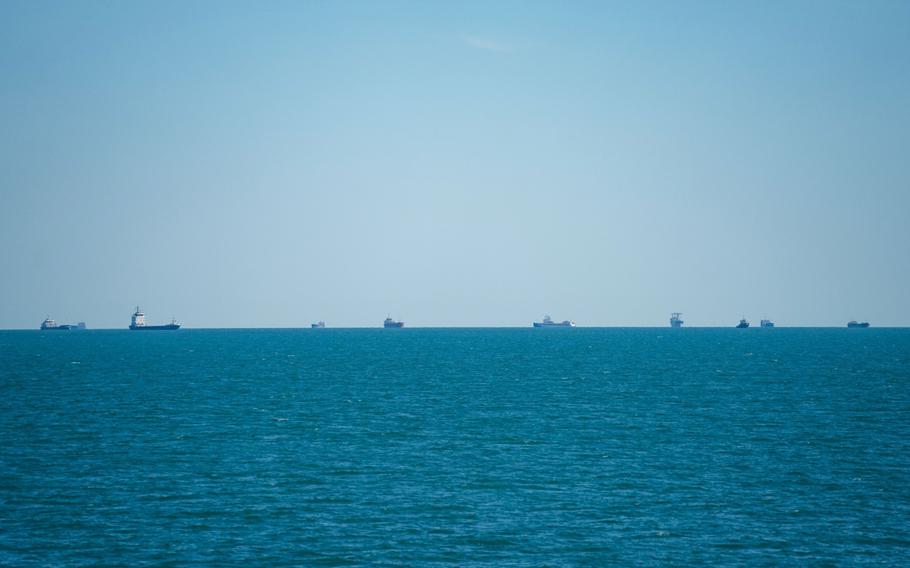 Cargo ships and bulk carriers moored offshore while waiting for port access in the Black Sea, near the shipping port of Constanta, Romania, on June 21, 2022.