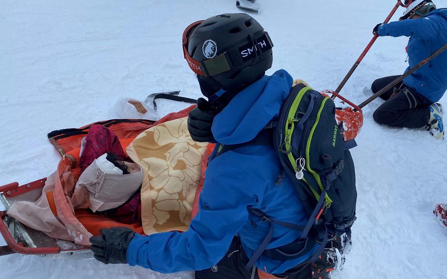 Three members of 1st Battalion, 7th Marines rendered first aid to a Japanese teenager who suffered a head wound from a snowboarding accident at a Nagano ski area, Feb. 11, 2023.