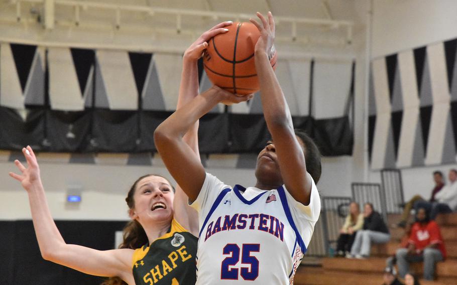 Yes, defense was actually played during the DODEA-Europe Girls All-Star Basketball Game in Vicenza, Italy, on Saturday, Feb. 24, 2024, as SHAPE’s Jessie Moon shows with a block of Ramstein’s Jalyn Jones. Moon was called for the foul, but her team eventually won and she was named co-MVP.