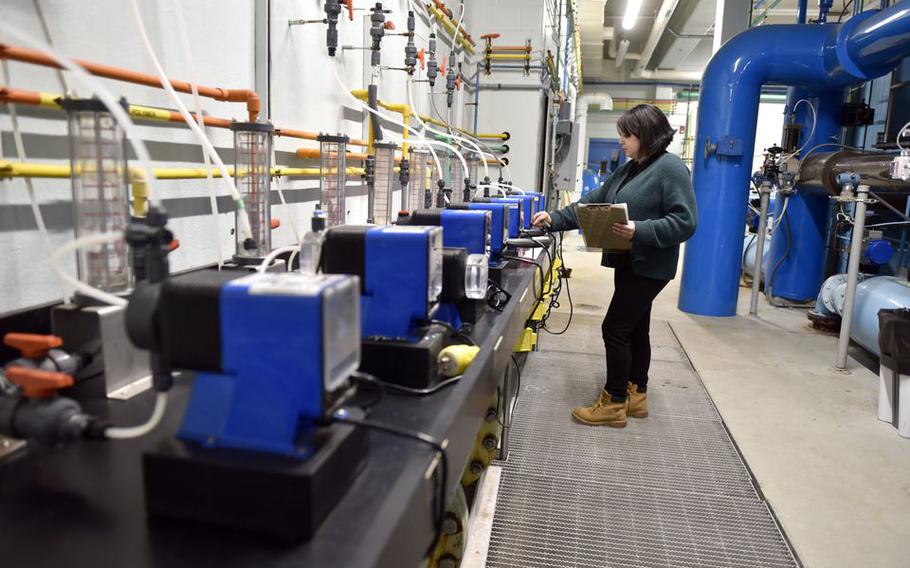 Brenda Lopez, head treatment plant foreman for Westfield’s Public Works Water Treatment Division, checks filter readings at the Reservoir Road filter station in Southwick, Mass.