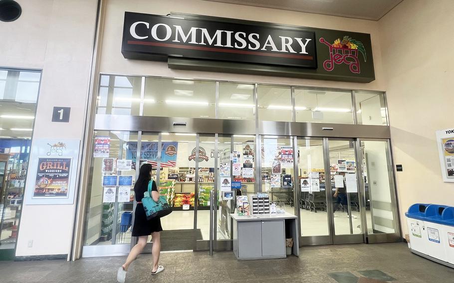 A shopper enters the commissary at Yokota Air Base, the home of U.S. Forces Japan in western Tokyo, June 6, 2024. 