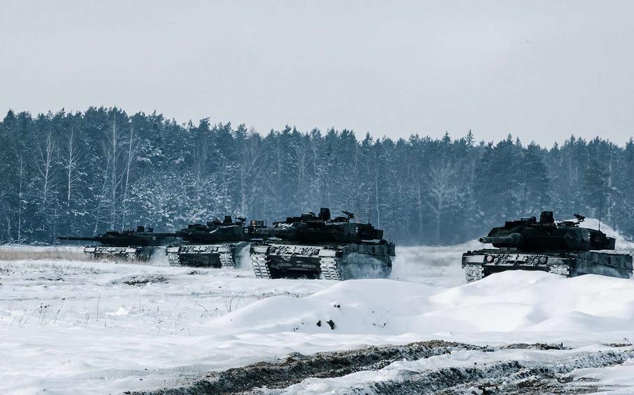 An undated file image shows German Leopard 2 tanks participating in exercises in Lithuania. Lt. Gen. Alfons Mais, head of the German army, warned that increasing the engagement on NATO's eastern front is putting stress on an underfunded German military.