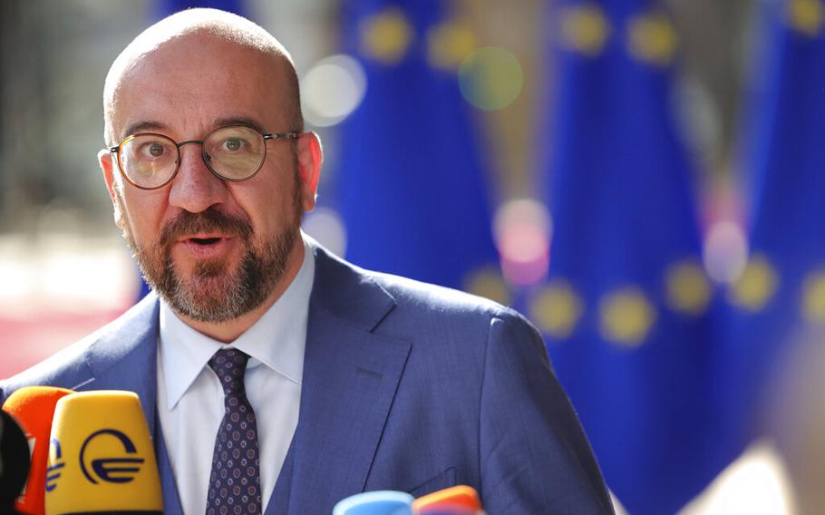 European Council President Charles Michel speaks with the media as he arrives for an EU summit in Brussels, Thursday, June 23, 2022. European Union leaders approved Thursday a proposal to grant Ukraine a EU candidate status, a first step on the long toward membership.