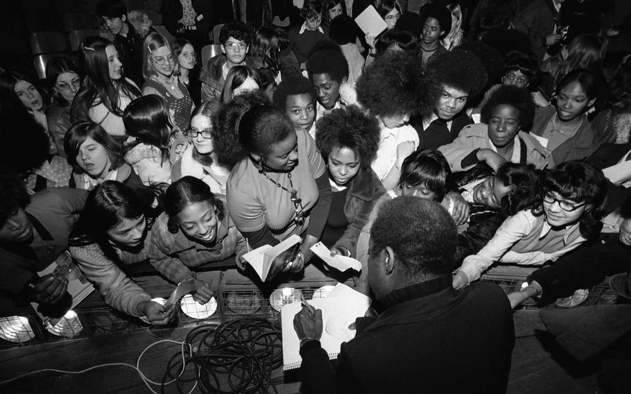 James Baldwin signs autographs at the Ludwigsburg High School, Feb. 16, 1973. The novelist, essayist and playwright was in town for the Black Literature and Culture Week, sponsored by Stuttgart’s newly formed chapter of the NAACP, the National Association for the Advancement of Colored People, held from Feb. 12-16, 1973. 