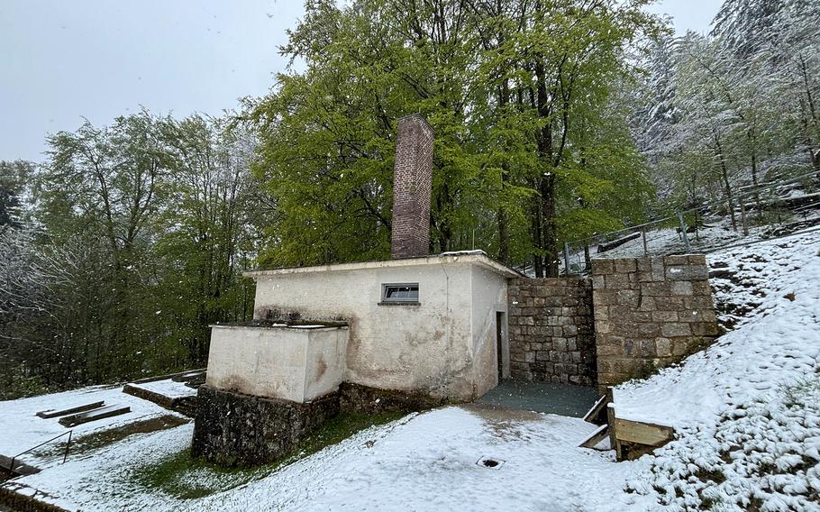 A light snow falls on the crematorium at the Flossenbürg concentration camp memorial in Germany on April 21, 2024.