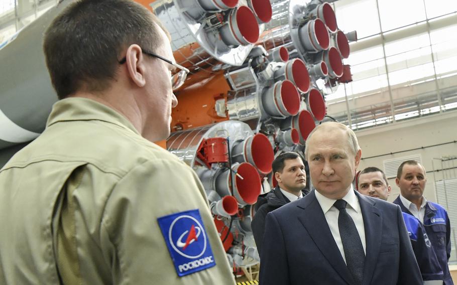 Russian President Vladimir Putin speaks with Roscosmos space agency employees at a rocket assembly factory during his visit to the Vostochny cosmodrome outside the city of Tsiolkovsky, about 200 kilometers (125 miles) from the city of Blagoveshchensk in the far eastern Amur region Tsiolkovsky , Russia, Tuesday, April 12, 2022. Russia on Tuesday marks the 61th anniversary of Gagarin’s pioneering mission on April 12 1961, the first human flight to orbit that opened the space era. 