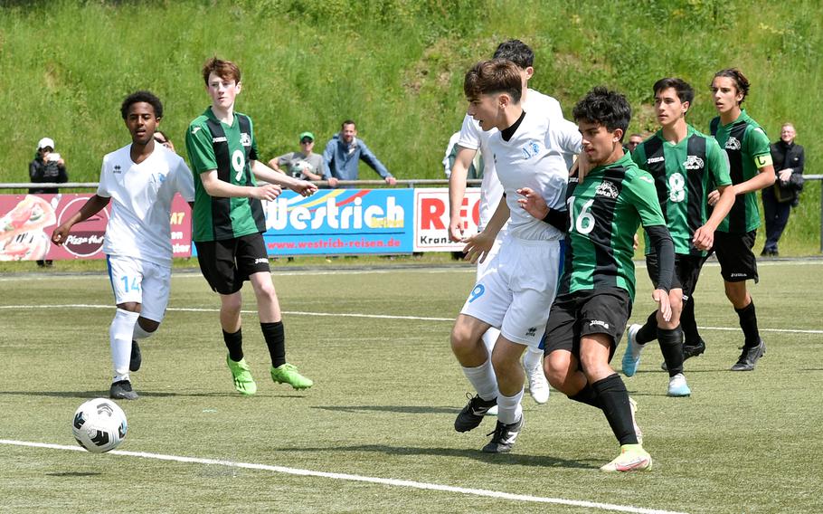 Marymount's Francescoti Rizzitelli and Naples' Alex Hermanson fight for the ball during a Division II semifinal at the DODEA European soccer championships on May 17, 2023, at VfR Baumholder's stadium in Baumholder, Germany.