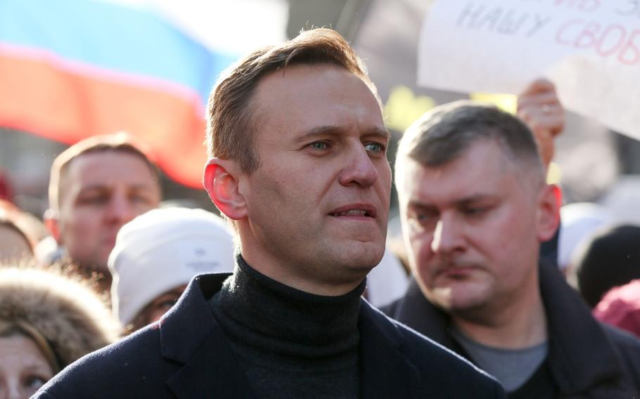 Alexey Navalny, Russian opposition leader, walks with demonstrators during a rally in Moscow on Feb. 29, 2019.