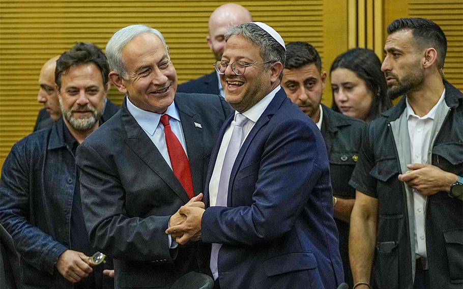 Israeli Prime Minister Benjamin Netanyahu and Israel’s National Security Minister Itamar Ben-Gvir smile before Netanyahu’s statement in the Knesset, Israel’s parliament in Jerusalem, Tuesday, May 23, 2023.
