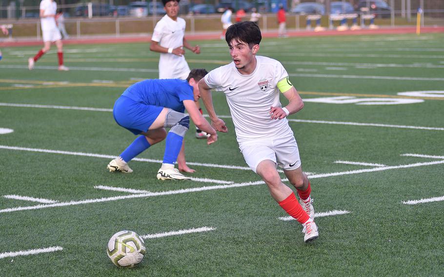 Kaiserslautern captain Tommy Cahill looks ahead as he dribbles down the left wing during a match against the Royals on April 12, 2024, at Ramstein High School on Ramstein Air Base, Germany.