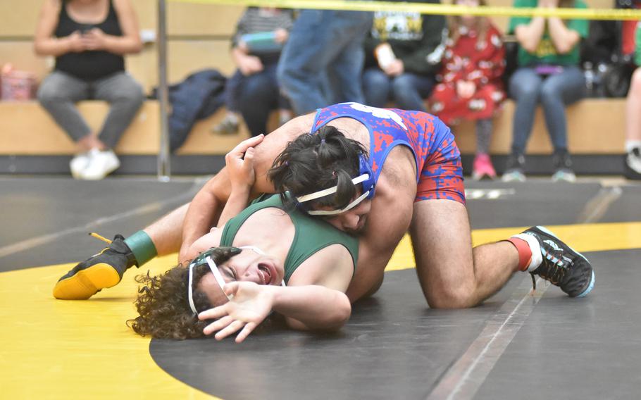 Ramstein’s Nathan Rutlege puts Ankara’s Giorgi Imerlishvili on his back at 175 pounds Friday, Feb. 9, 2024, at the DODEA European Wrestling Championships in Wiesbaden, Germany.