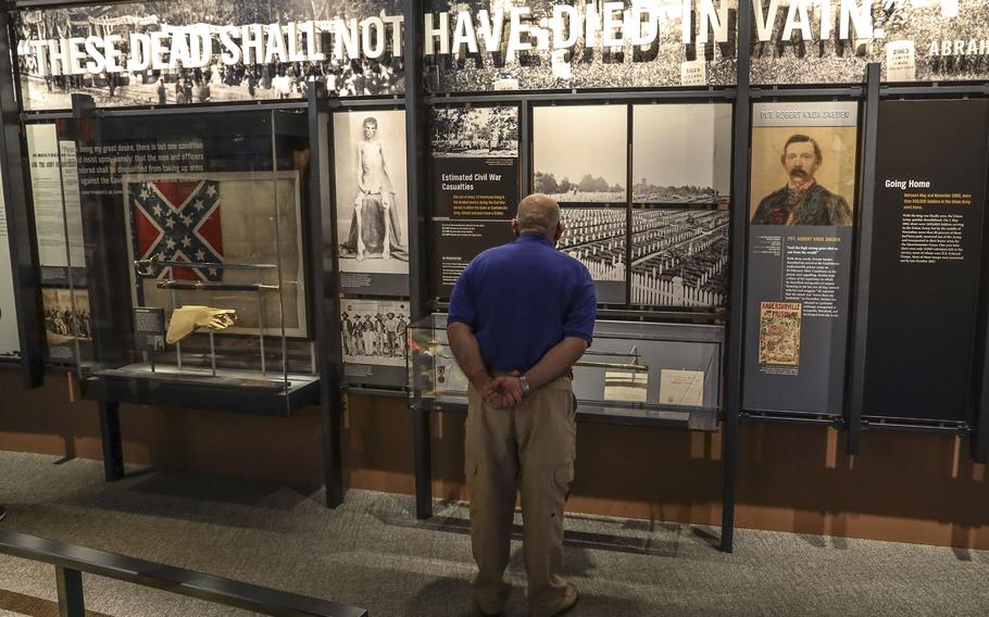 A visitor takes in the Civil War exhibit at the National Museum of the United States Army on its reopening day, June 14, 2021.