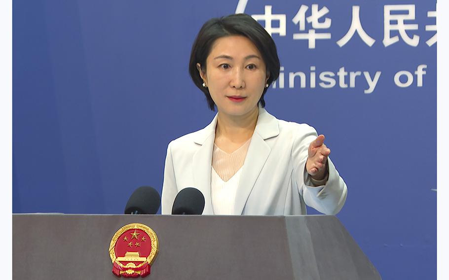 Chinese Foreign Ministry spokesperson Mao Ning gestures during a briefing at the Ministry of Foreign Affairs in Beijing, Wednesday, May 24, 2023. 