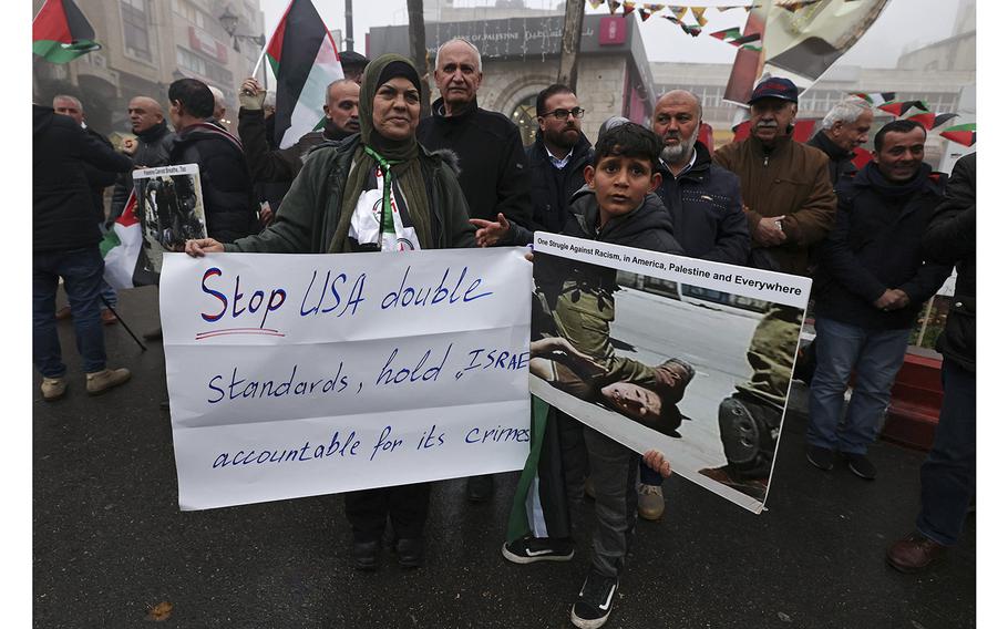 Palestinians protest in Ramallah in the West Bank on Jan. 31, 2023. 