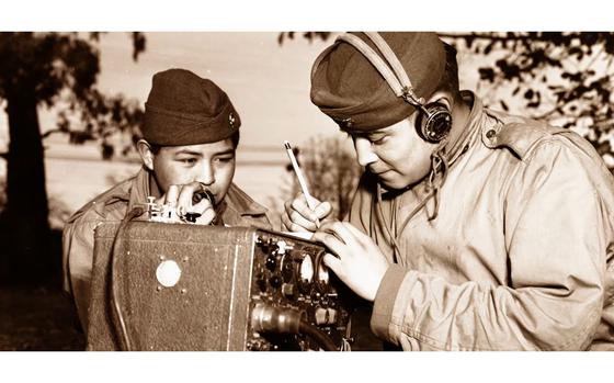 A video screen grab shows Navajo Code Talkers during World War II.