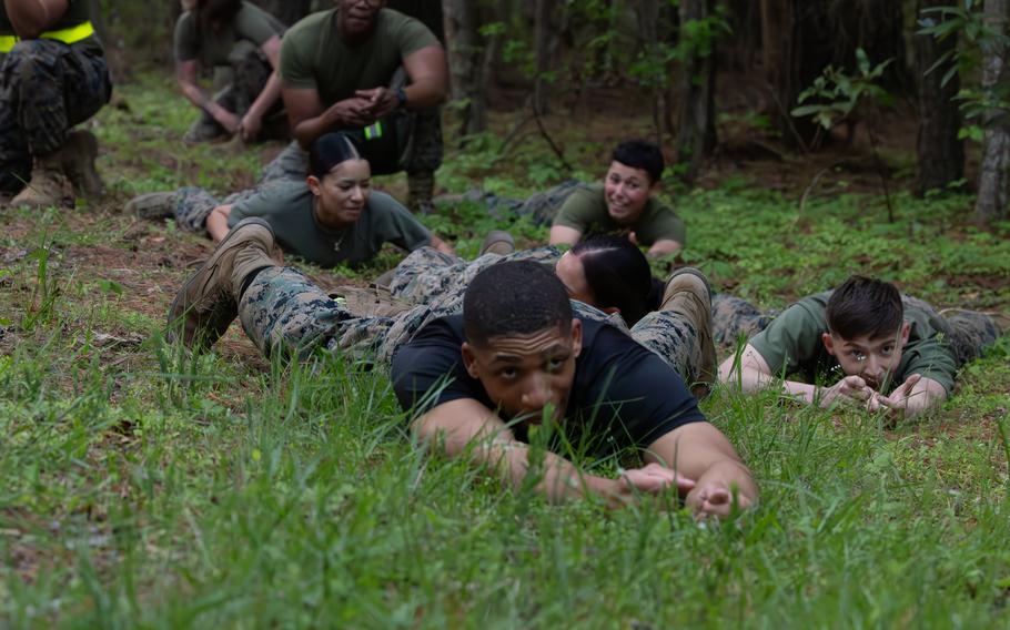 U.S. Marines and U.S. Airmen respond to a simulated threat