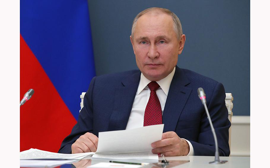 Russian President Vladimir Putin addresses the virtual World Economic Forum via a video link from Moscow on Jan. 27, 2021. 