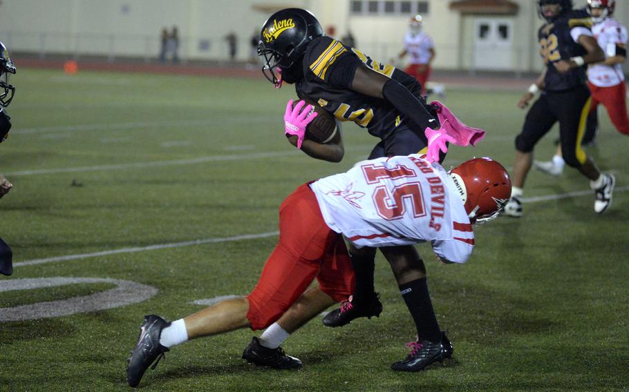 Keanu Serban makes a tackle.