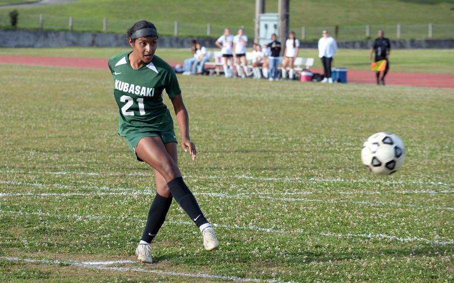 Solares Solano sends a kick toward the goal.