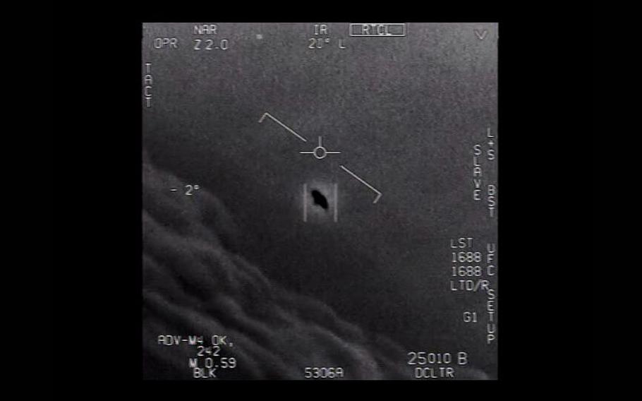 An F/A-18 Super Hornet military jet captured this infrared video from several miles away of an unidentified flying object moving at high speed. The Department of Defense removed the date and location of the footage before releasing it. 