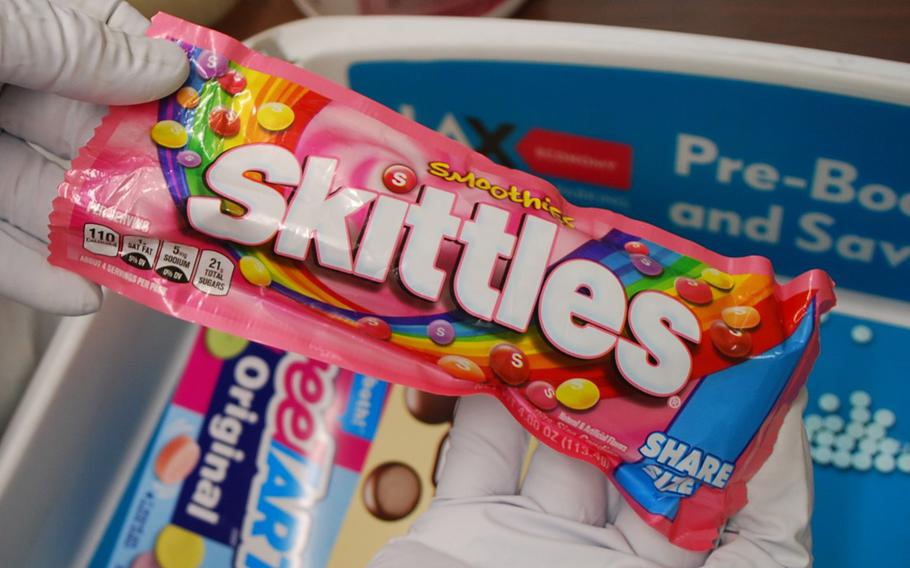 Suspected fentanyl pills were hidden in packs of Skittles candy at Los Angeles International Airport. 